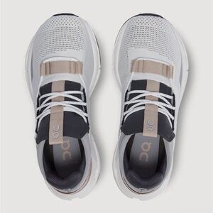 On Running Sneakers in White, Black, and Tan